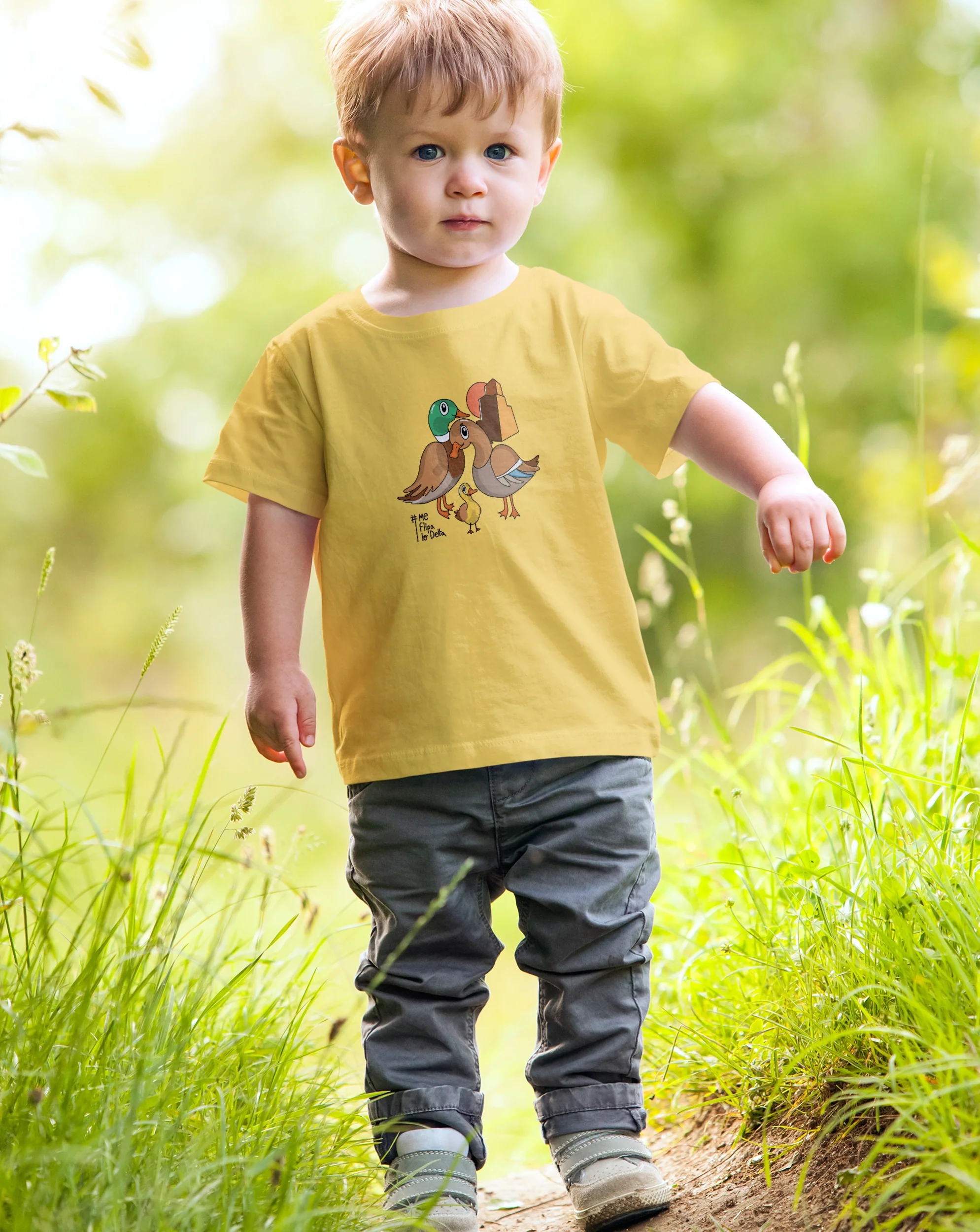Camiseta manga corta infantil de niño y niña en color mostaza y estampado de patos Delta del Ebro
